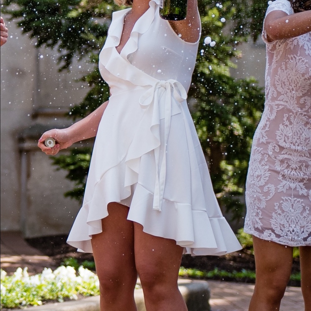 White ruffle mini dress